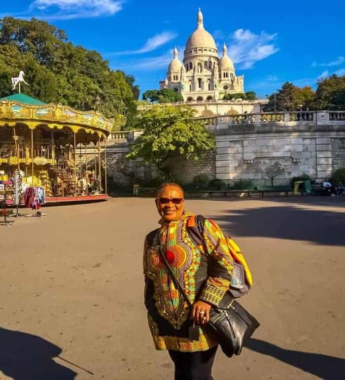 solo female travel - woman in front of sacre coeur